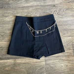 Black denim skirt with removable “cowboys” chain belt